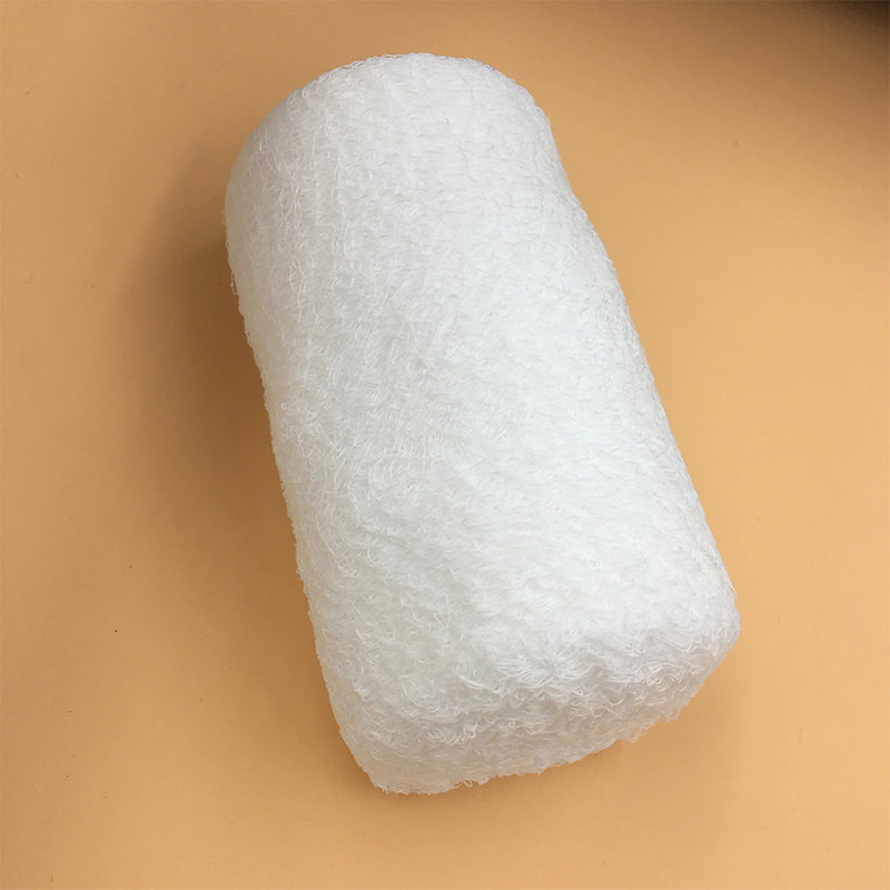 اضرب ضمادة شاش Krinkle